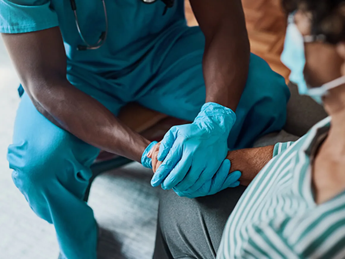 Nurse comforting a patient