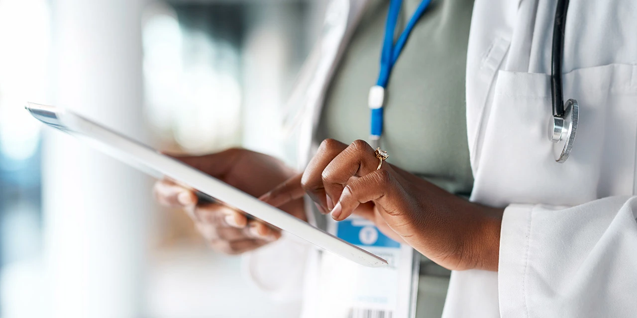 Stock photo depicting a clinician using a tablet. (Hiraman/E+ via Getty Images)