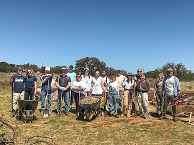 Students and founding donor Andrew McGown, fourth from the right, at Texas State University’s student-run fruit and vegetable farm, Bobcat Farm, which is managed by the author. (Photo by Nicole Wagner)