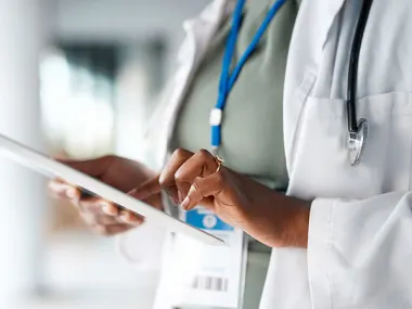 Stock photo depicting a clinician using a tablet. (Hiraman/E+ via Getty Images)