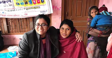 Photo of Dr Aparna Sharma with an ASHA worker