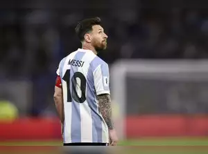 Argentina's Lionel Messi walks off the field at the half time of a FIFA World Cu...