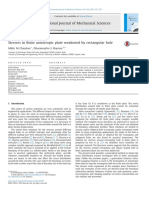 Stresses in Finite Anisotropic Plate Weakened by Rectangular Hole