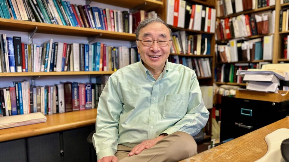 Portrait of Prof. Henry Hu in his office