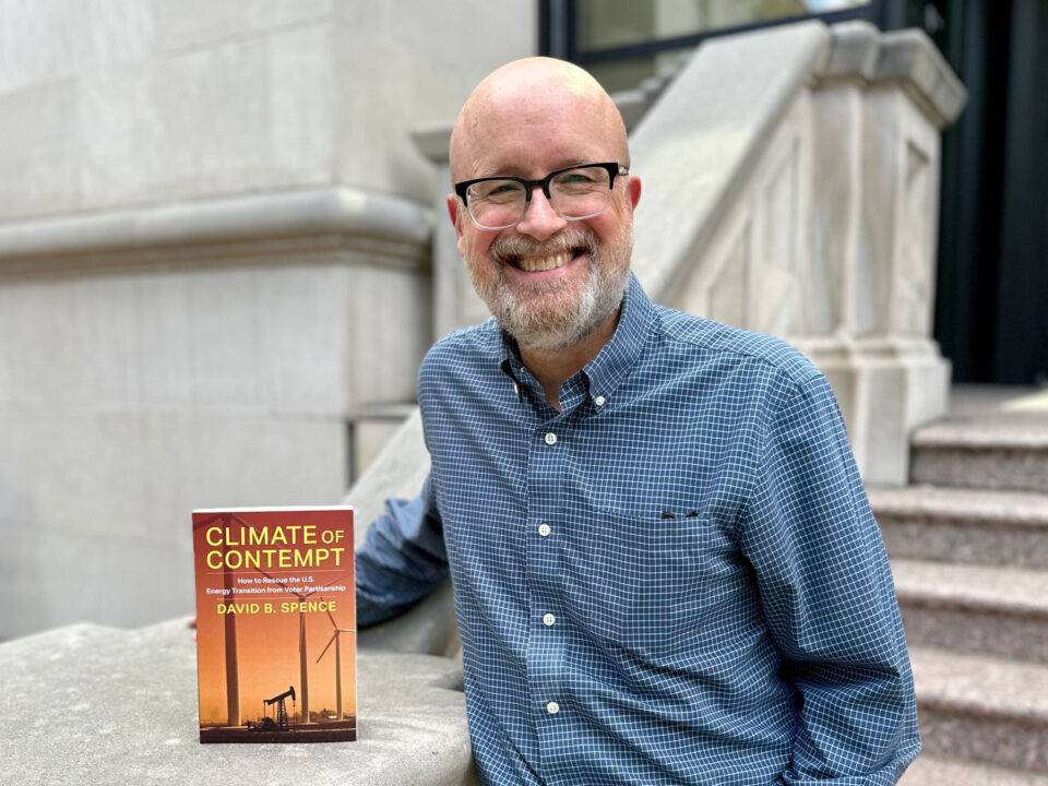 David Spence outside CCJ with his book