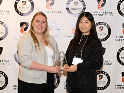 Student accepting award from ALDF