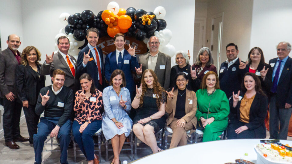 University of Texas at Austin alumni pose for a photo with the Dean of the University of Texas Law School, Bobby Chesney, during the Laredo stop of the "Texas Law on Tour" series on Wednesday, January 31, 2024.