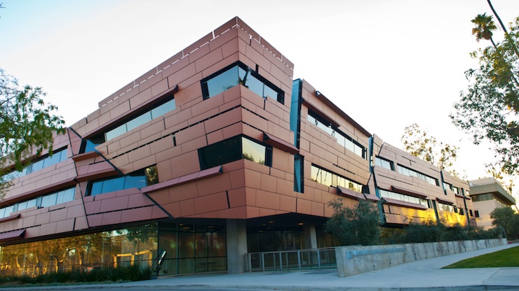 copper-colored contemporary building with sharp angles