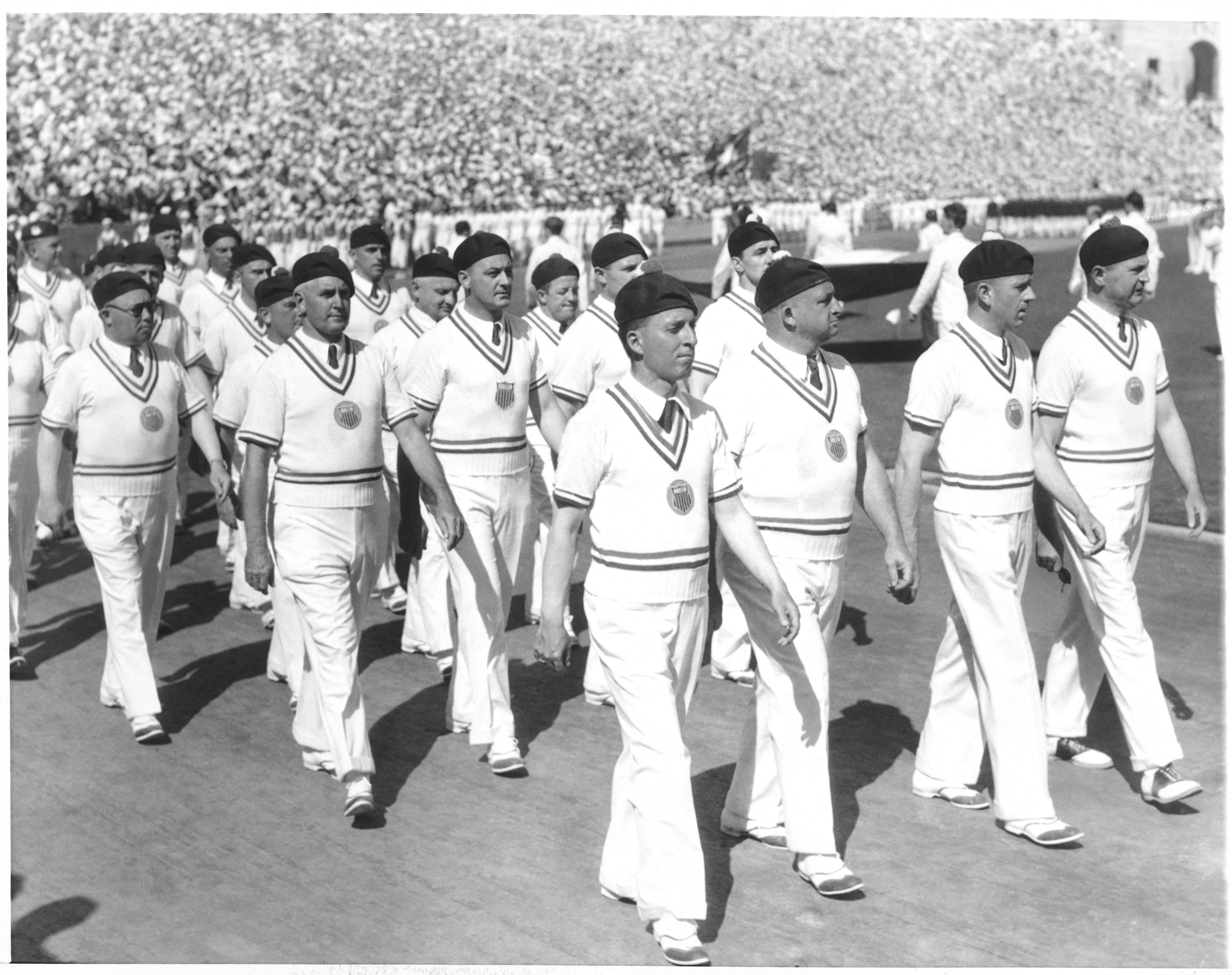 A black-and-white image of Members of the US team marching in the opening ceremony of the 1932 Olympic Games in Los Angeles