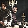 Aidan Gillen and Maisie Williams in Game of Thrones (2011)