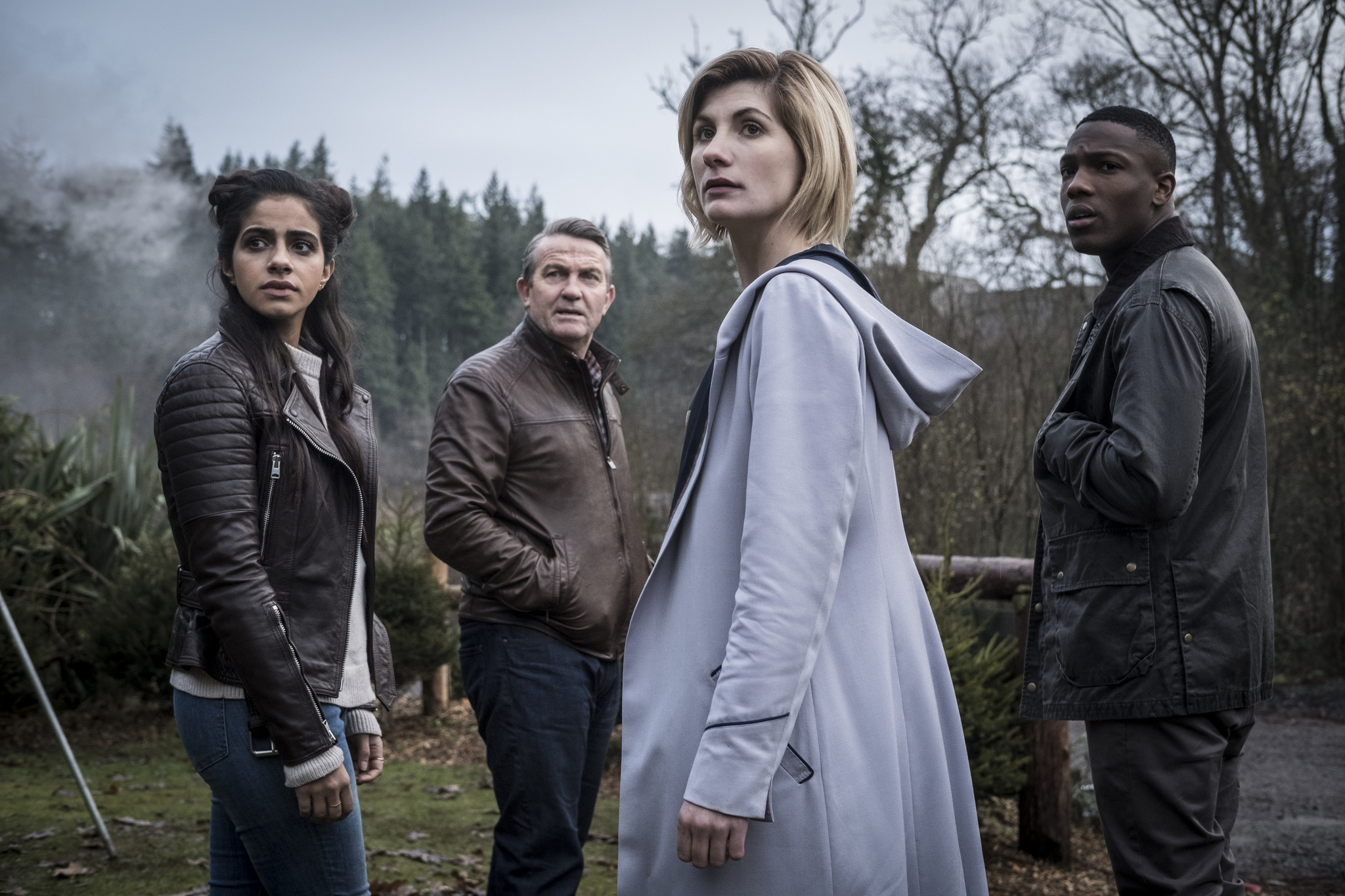 Bradley Walsh, Jodie Whittaker, Tosin Cole, and Mandip Gill in Doctor Who (2005)