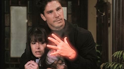 Holly Marie Combs and Michael Trucco in Charmed (1998)