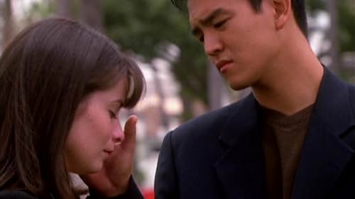 Holly Marie Combs and John Cho in Charmed (1998)