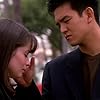 Holly Marie Combs and John Cho in Charmed (1998)