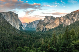 Image may contain Nature Outdoors Mountain Tree Plant Fir Abies Mountain Range and Cliff