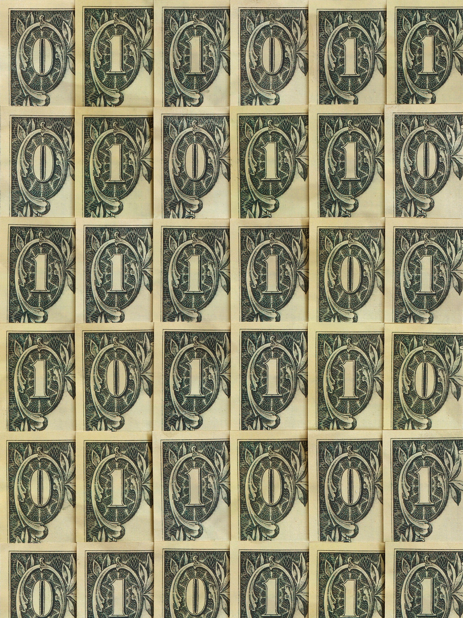 The corner of dollar bills laid out in a grid representing binary code.