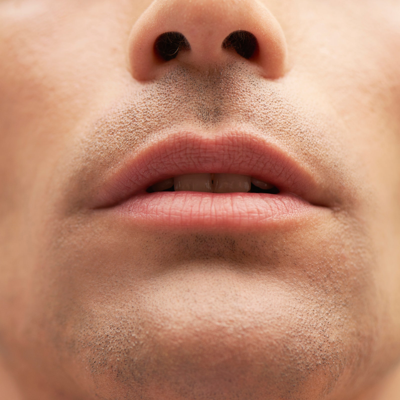 A closeup picture of a persons mouth.