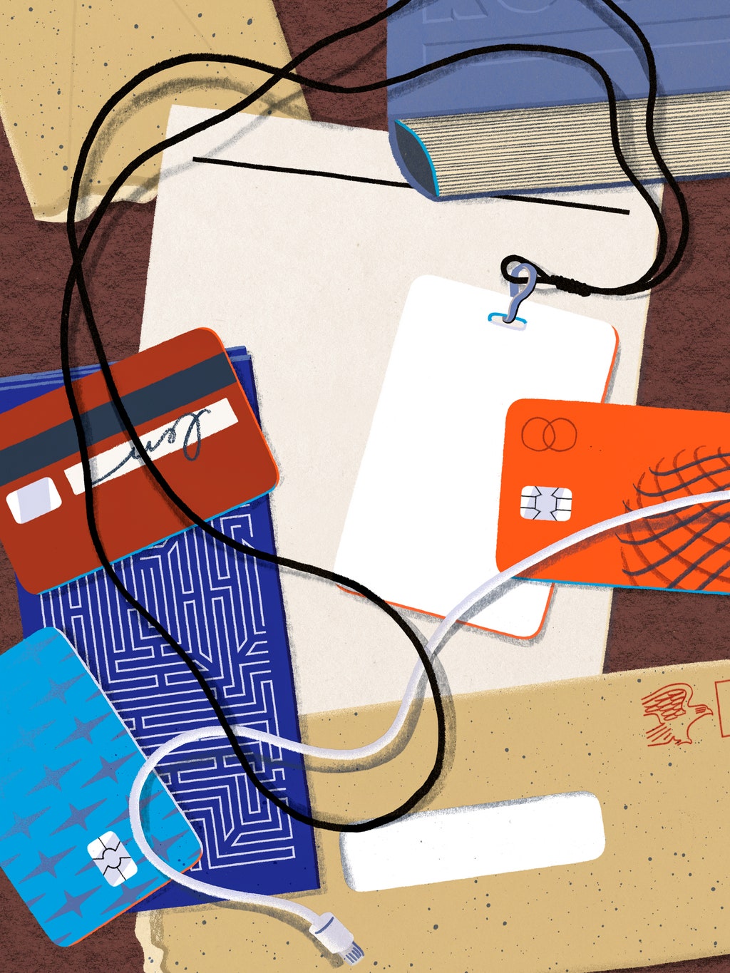 An illustration of a tabletop workspace with a letter bank cards paper a lanyard a charger and other items on it.