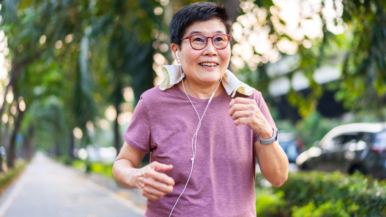 Older female jogging outdoors