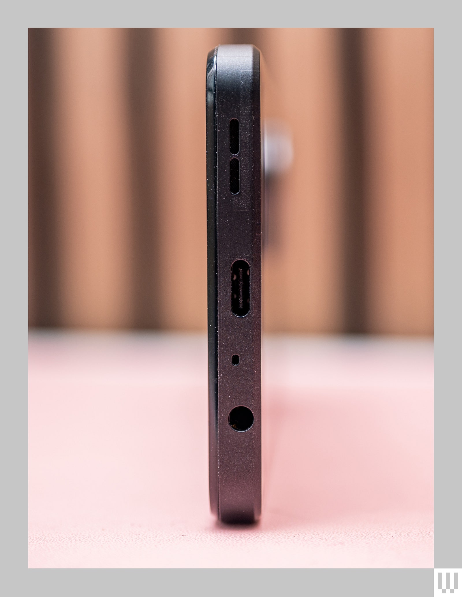 Side view of the HMD Fusion a slim black mobile phone showing the ports