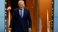 US President Joe Biden disembarks from Air Force One as he arrives in Berlin late Thursday