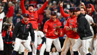 The Cleveland Guardians celebrate David Fry's game-winning home run in the 10th inning to defeat the New York Yankees in the Major League Baseball playoffs