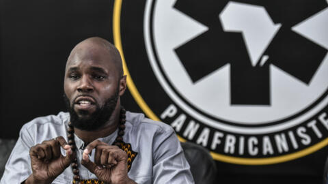 Anti-colonial activist Kemi Seba addresses a press conference in Paris on 26 June 2020.