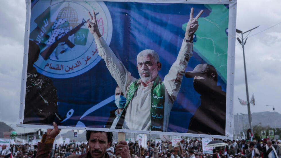 A Houthi supporter holds a poster of Yahya Sinwar, head of the Palestinian Islamic movement Hamas, during a protest marking Jerusalem Day in support of Palestinians in the Gaza Strip, in Sanaa, Yemen, Friday, April 05, 2024.