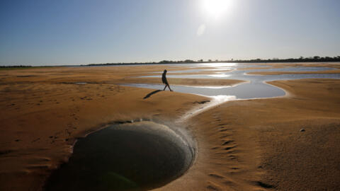 The exposed sandbanks of the Paraguay River, near Villeta, Paraguay, 12 October 2024. The river's water levels have dropped dramatically due to a drought in Brazil, upstream, which has fuelled a conflict between fishermen and rice farmers over water use.