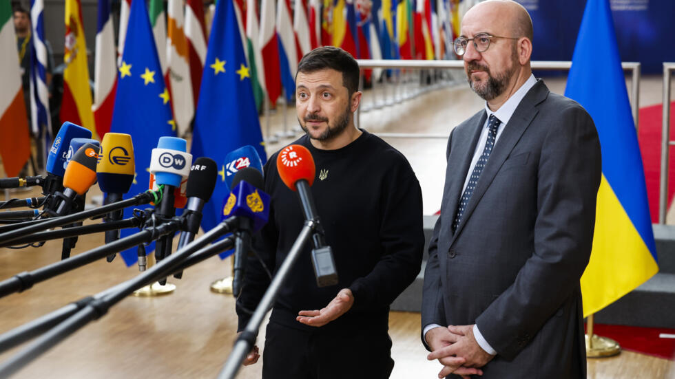 Ukraine's President Volodymyr Zelenskyy, left, and European Council President Charles Michel talk to journalists as they arrive to an EU summit in Brussels, Thursday, Oct. 17, 2024.