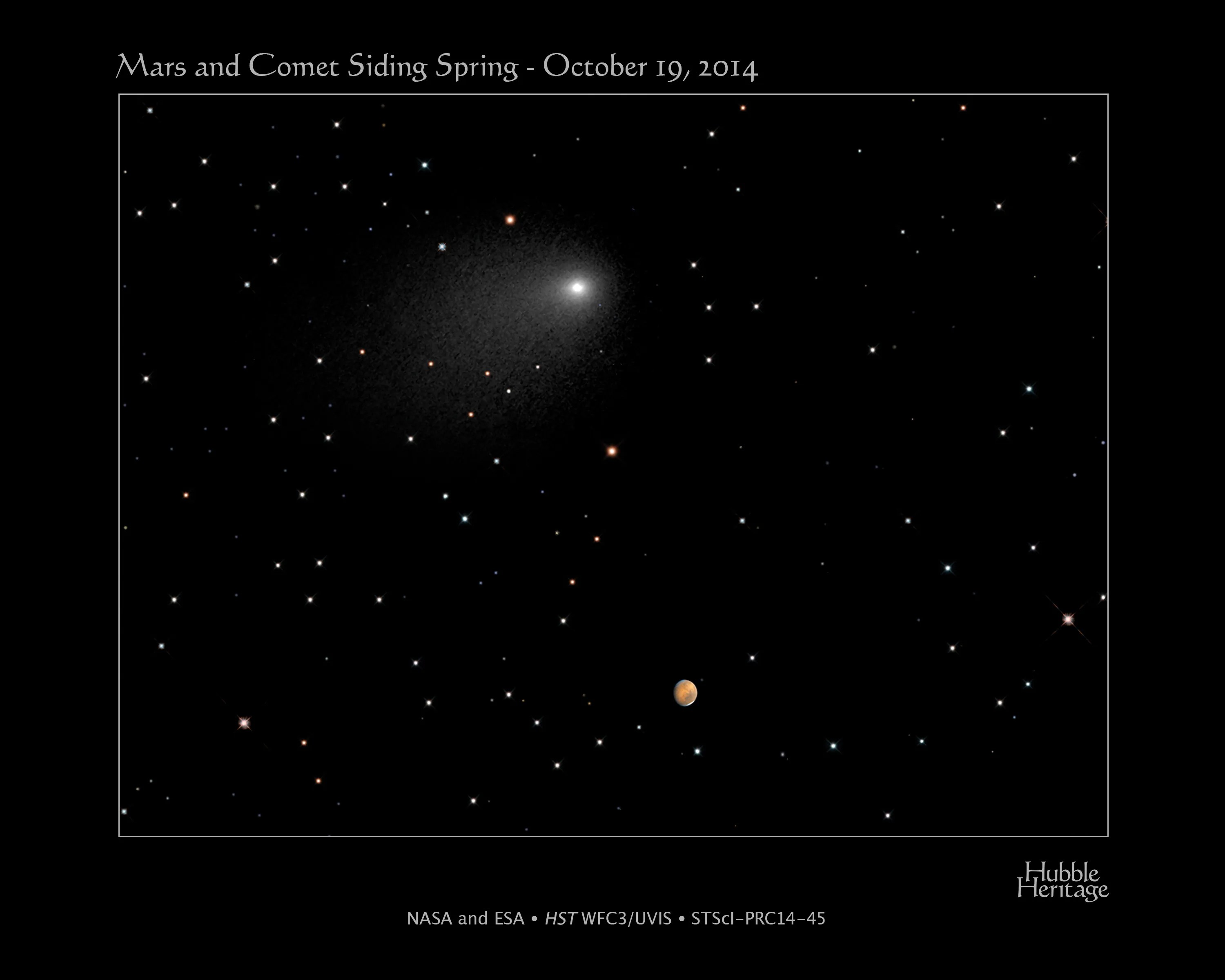 Bright comet is seen above red Mars against a backdrop of stars