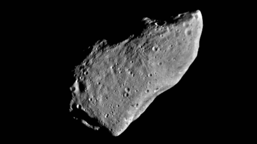 A close view of asteroid Gaspra in the darkness of space.