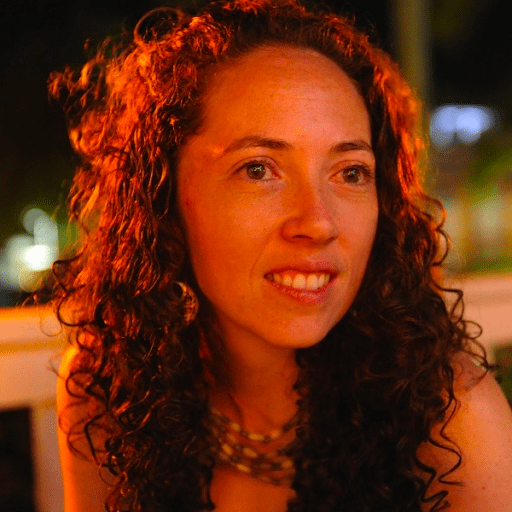 Portrait photo of a woman with long curly hair