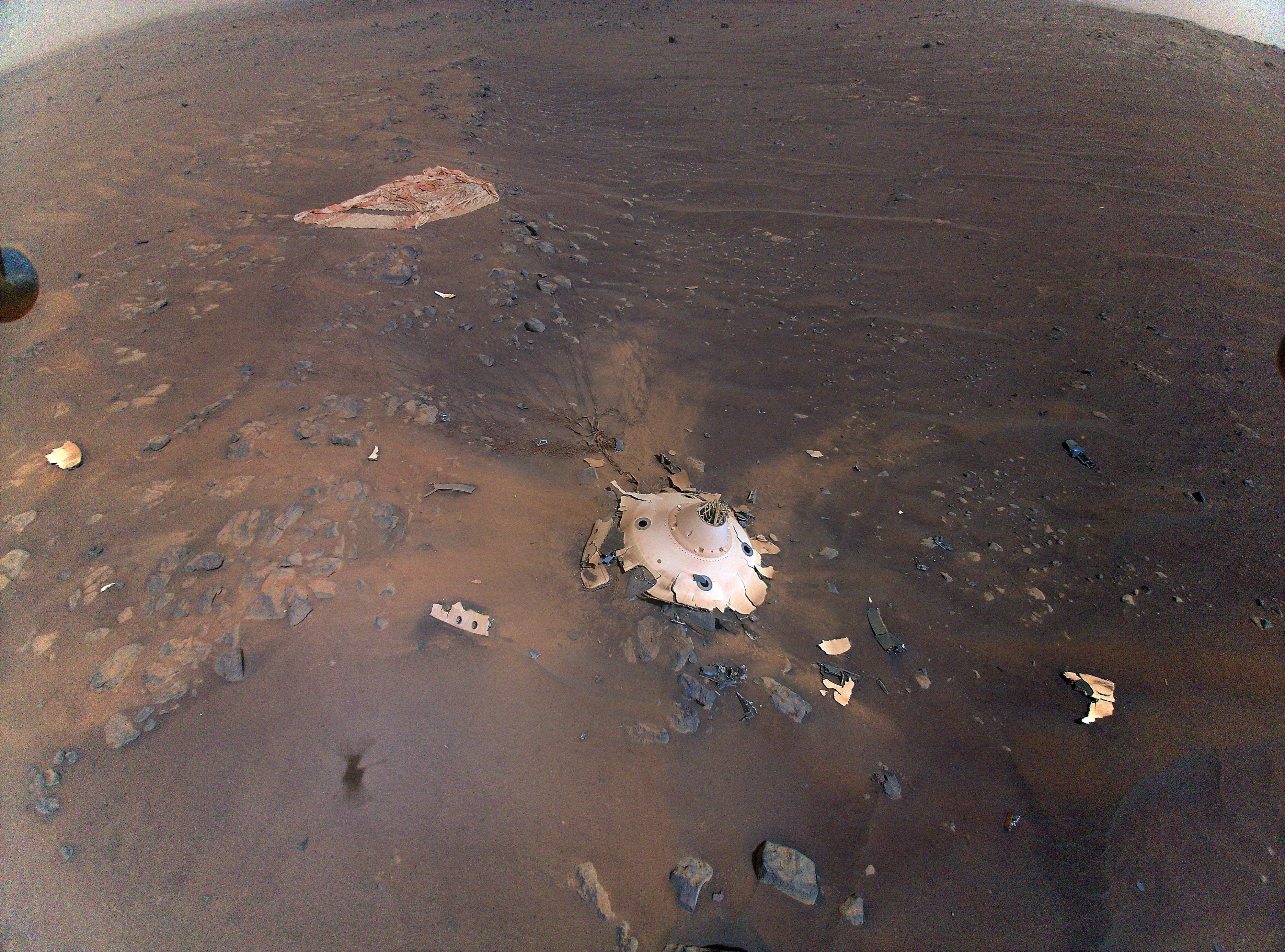 This image of Perseverance's backshell and parachute was collected by NASA's Ingenuity Mars Helicopter during its 26th flight on April 19, 2022.