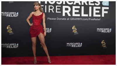 Taylor Swift scorches up Grammys 2025 red carpet in daring red mini-dress; accept rose from fan - WATCH