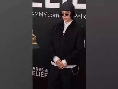 Billie Eilish arrives in classic black look at the 2025 Grammys