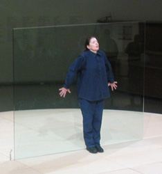 Abramović performing Bruce Nauman's Body Pressure.