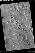 Row of mounds, as seen by HiRISE under HiWish program. Arrows point to some of the mounds.