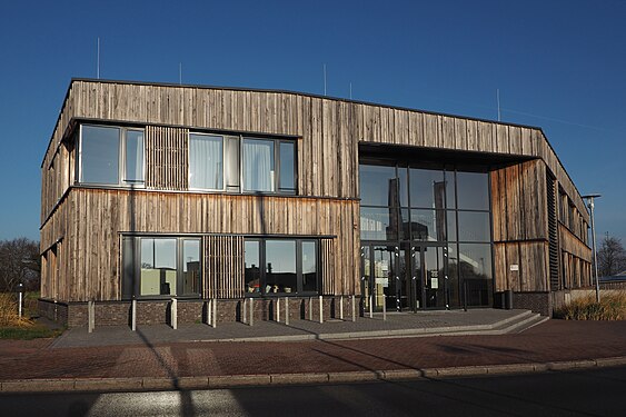 Municipal flagship building of Stadtwerke Neustadt in Holstein, Germany, made predominantly from recycled materials from the Baubörse (building material exchange)