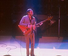 John Entwistle playing a bass guitar