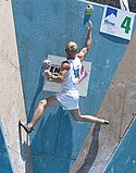 A climber doing the bridging technique