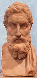 Photo of a bust of bearded man