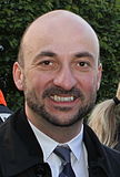 Luxembourg has gay PM, and deputy; gaynz.com, 6. Dezember 2013. Den Etienne Schneider, weder Auteur nach Lizenz.