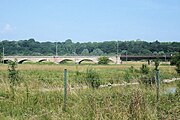 Flutbrücke, links sechs ursprüngliche Bögen, rechts der Stahlersatz nach dem Unfall von 1890