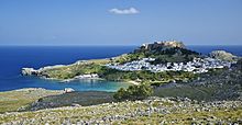 General view of the village of Lindos, with the acropolis and the beaches, island of Rhodes, Greece.