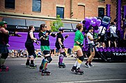 Rollerskaters dance in Canada's Edmonton Pride Parade, 2011