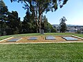 Gravesite for the unclaimed dead of the Jonestown Massacre (behavior: cults of personality)