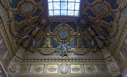 Neoclassical sculpted decoration on the ceiling of the Salon Carré, Louvre Palace, by Pierre-Charles Simart, 1851[53]