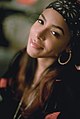 Image 2Aaliyah wearing a bandana and hoop earrings in 2000 (from 2000s in fashion)