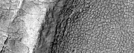 High-center polygons, as seen by HiRISE under HiWish program. Image is of the top of a debris apron in Deuteronilus Mensae.